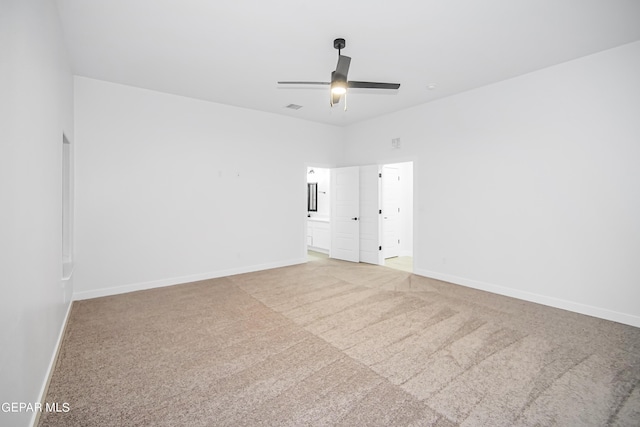 empty room featuring carpet and ceiling fan