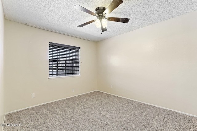 unfurnished room featuring ceiling fan, carpet floors, and a textured ceiling