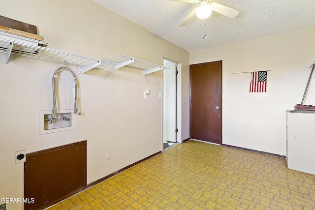 laundry area featuring ceiling fan, washer hookup, hookup for an electric dryer, and a textured ceiling