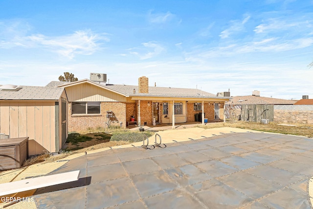 rear view of house featuring a patio area