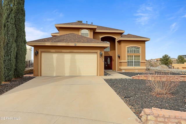 view of front of property featuring a garage