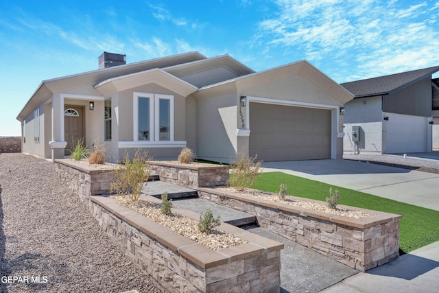 view of front of property featuring cooling unit and a garage