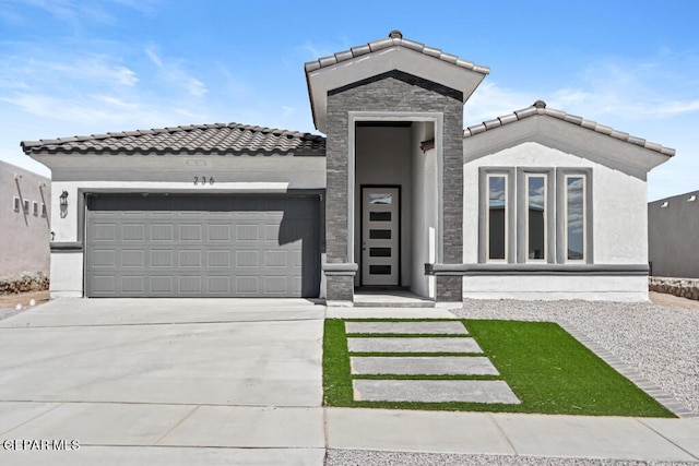 view of front of property with a garage