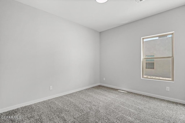 spare room with carpet flooring