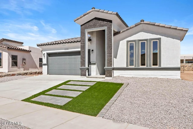 view of front of home with a garage