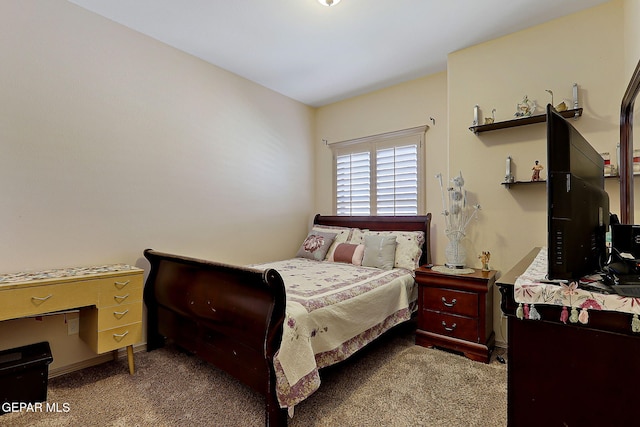 bedroom featuring dark colored carpet