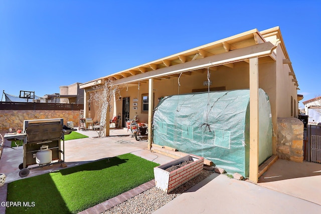 exterior space with a patio area