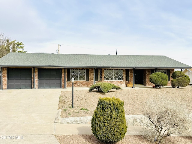 single story home featuring a garage