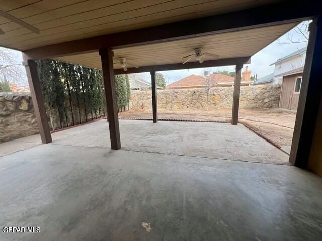 view of patio featuring ceiling fan