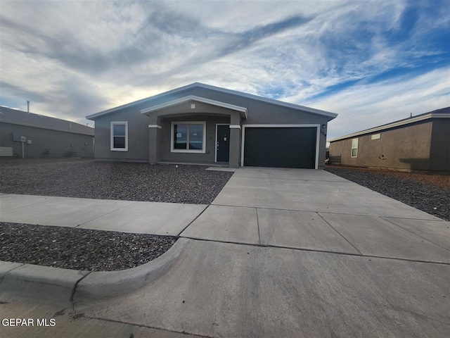 view of front of home with a garage