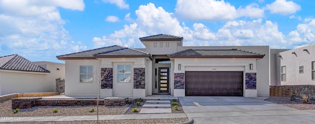 view of front of home with a garage