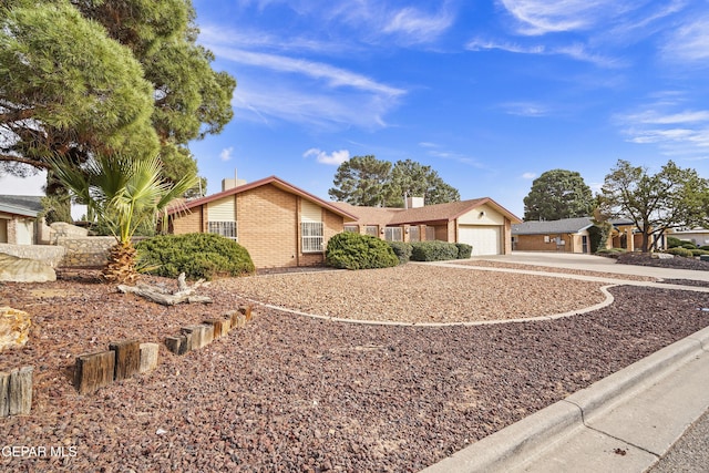 single story home featuring a garage