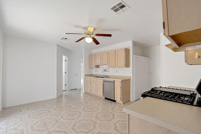 kitchen with stainless steel appliances, visible vents, a ceiling fan, light countertops, and light brown cabinetry