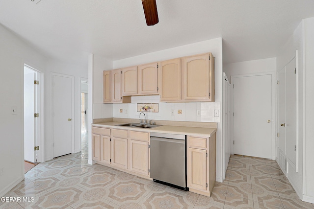 kitchen featuring a ceiling fan, dishwasher, light countertops, light brown cabinets, and a sink