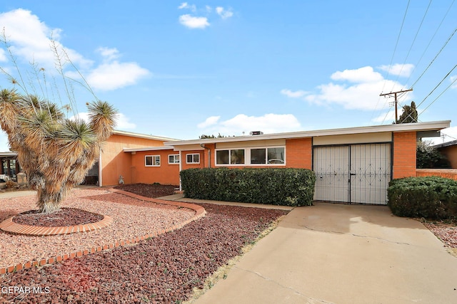 ranch-style home with a garage