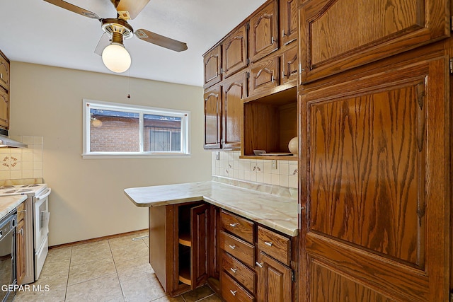 kitchen with white electric range oven, light tile patterned floors, black dishwasher, ceiling fan, and backsplash