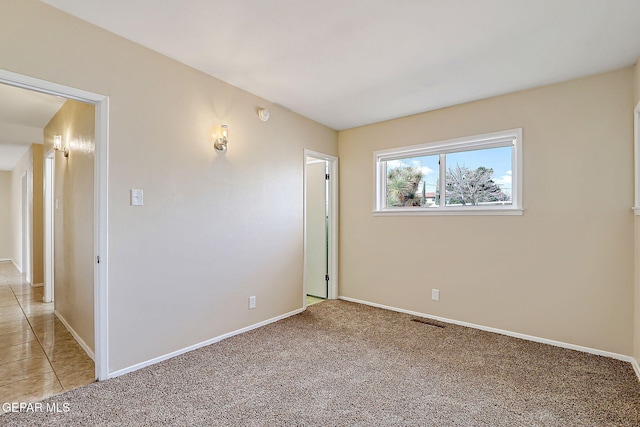 view of carpeted spare room