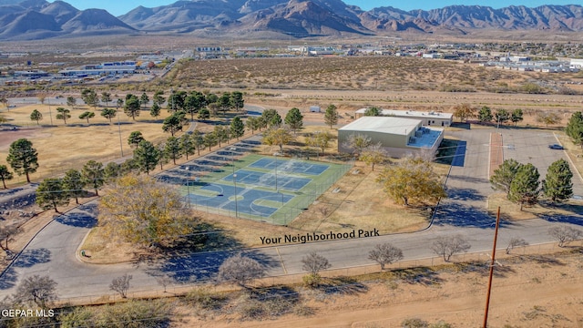 birds eye view of property featuring a mountain view