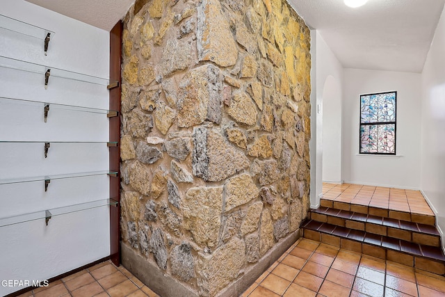 room details with a textured ceiling