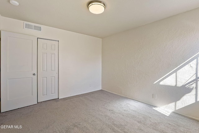 unfurnished bedroom featuring carpet floors