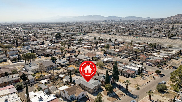 drone / aerial view featuring a mountain view