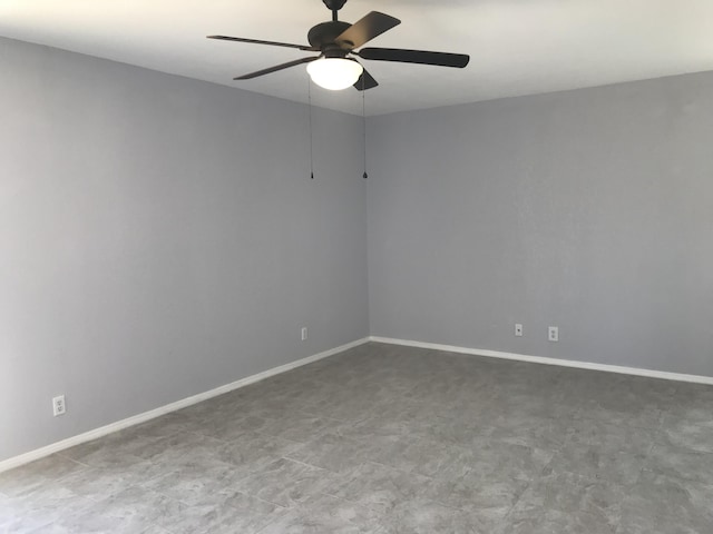 spare room with ceiling fan