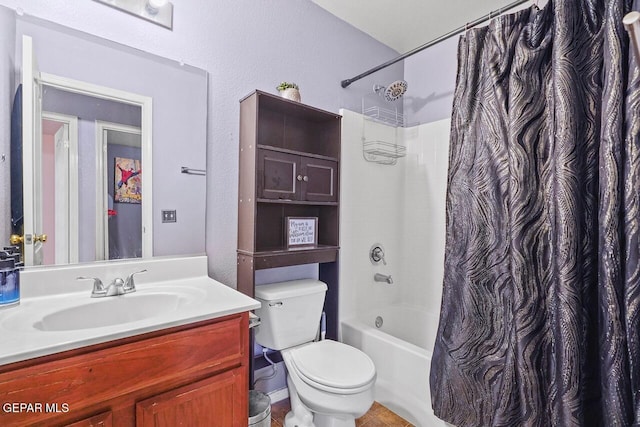 full bathroom with vanity, toilet, and shower / tub combo with curtain