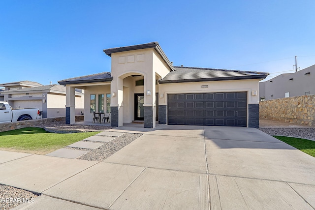 view of front of home featuring a garage