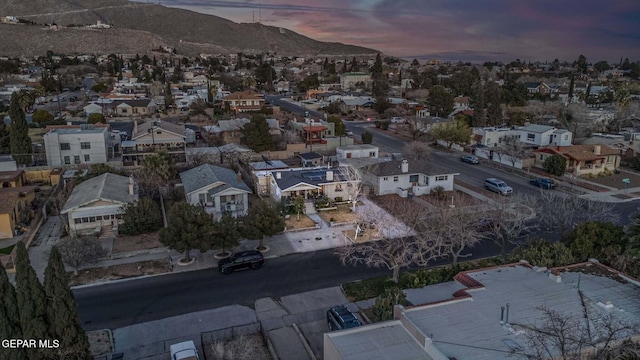 aerial view at dusk with a mountain view