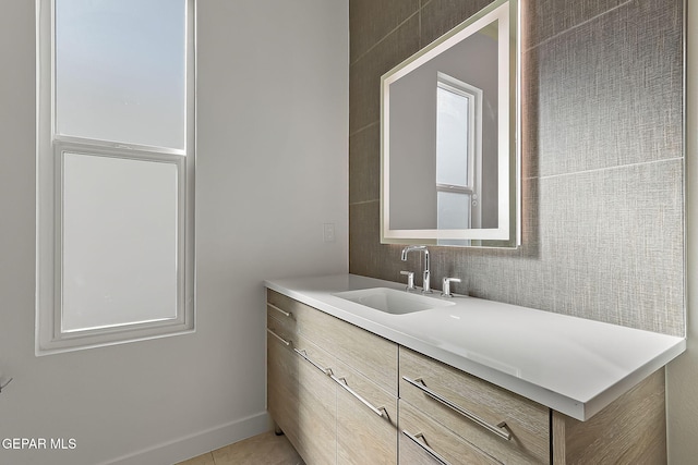 bathroom featuring vanity and tile patterned flooring