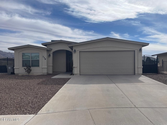 ranch-style home with a garage