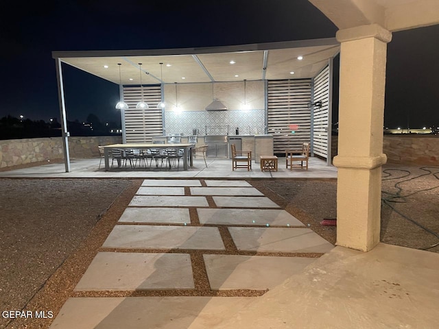 view of patio at night