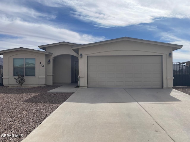 ranch-style home with a garage