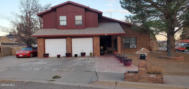 view of front of home featuring a garage