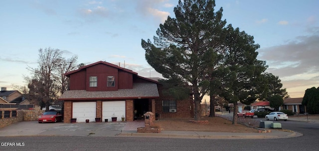 view of front of property with a garage