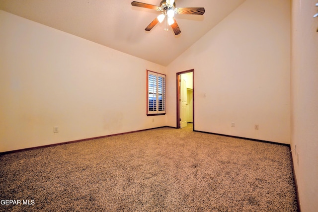 empty room with high vaulted ceiling, light carpet, and ceiling fan