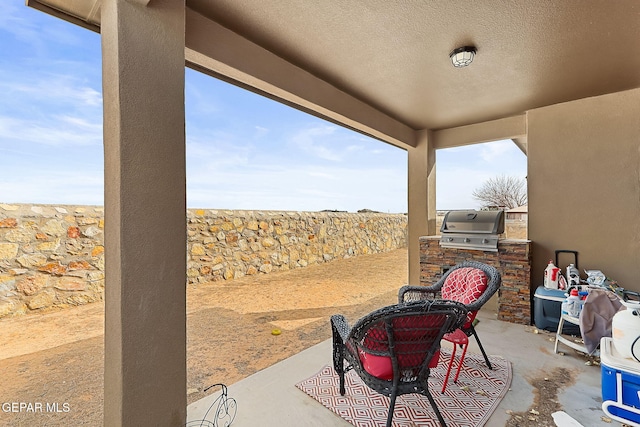 view of patio with a grill and exterior kitchen