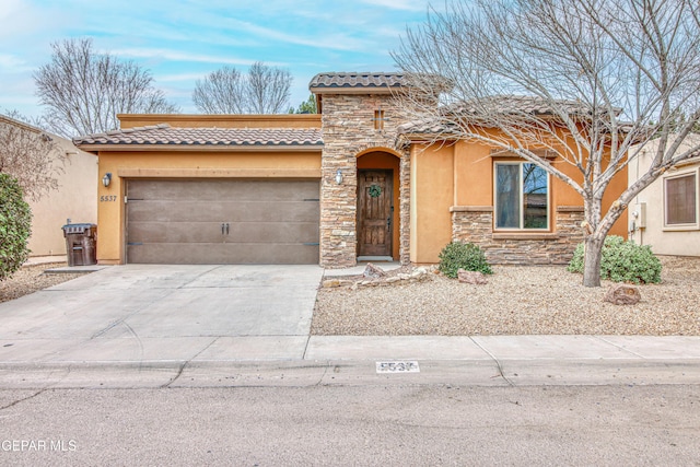 view of front of property featuring a garage