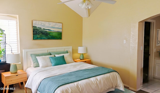 bedroom featuring lofted ceiling