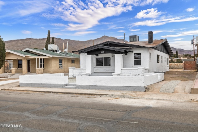 view of front of house with a mountain view