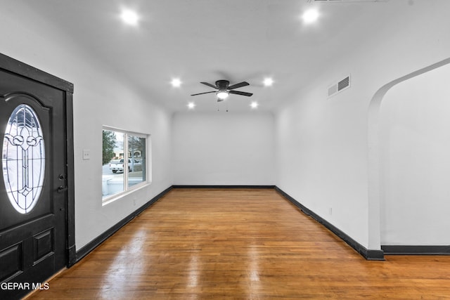 entryway featuring hardwood / wood-style flooring and ceiling fan