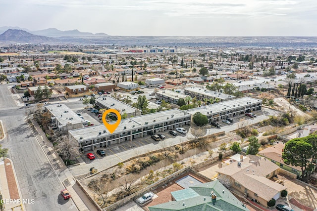 drone / aerial view featuring a mountain view