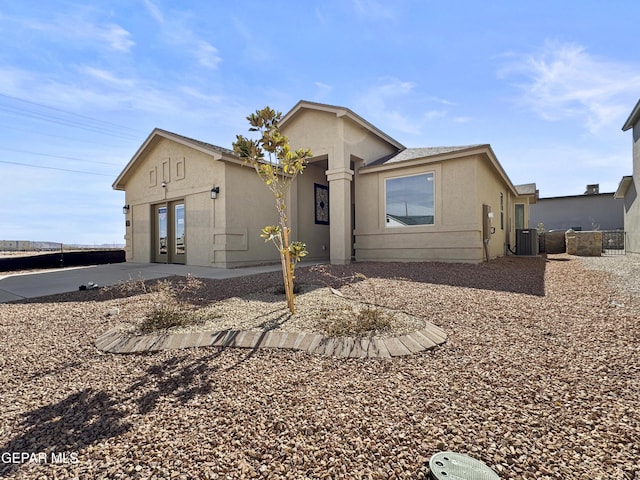 view of front of home with cooling unit