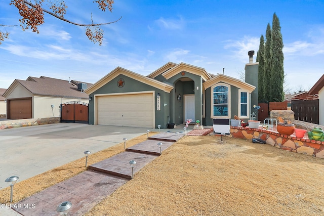 ranch-style house featuring a garage