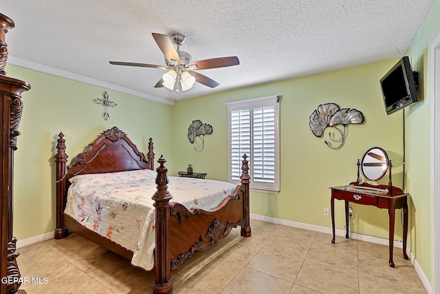 bedroom featuring ceiling fan, a textured ceiling, and light tile patterned floors