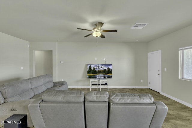 living room with ceiling fan