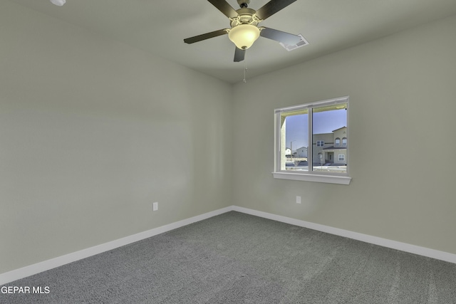 carpeted empty room with ceiling fan