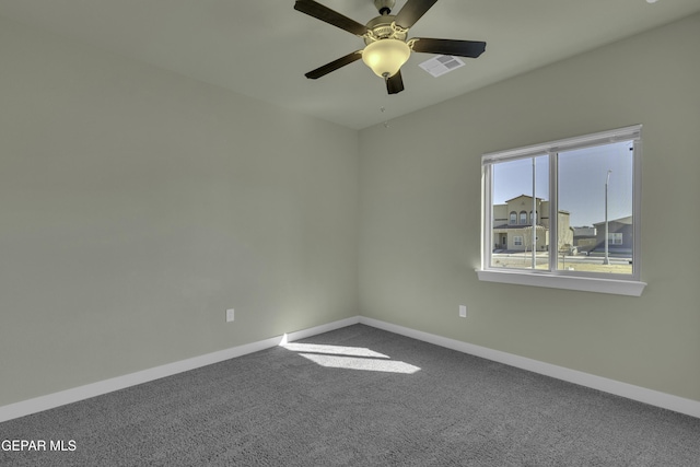 unfurnished room with carpet flooring and ceiling fan