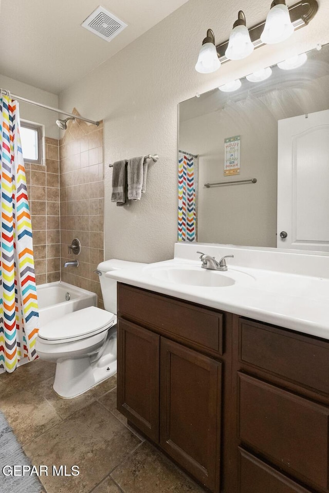 bathroom featuring toilet, shower / bathtub combination with curtain, visible vents, and vanity