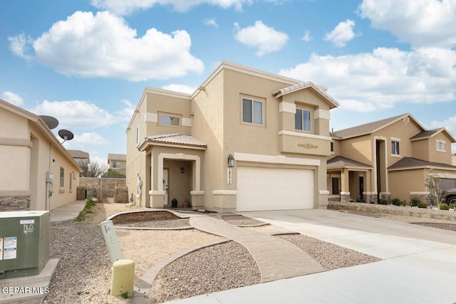 view of front of property with a garage, concrete driveway, a residential view, a tiled roof, and stucco siding